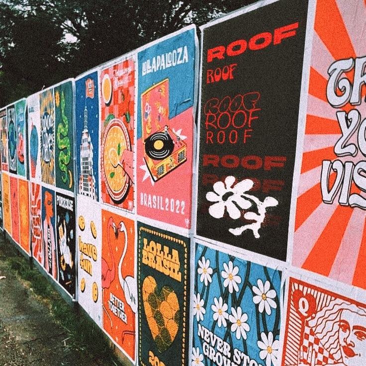 Wall of posters with ROOF